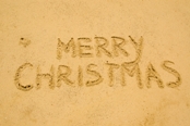 Merry Christmas Written in Sand